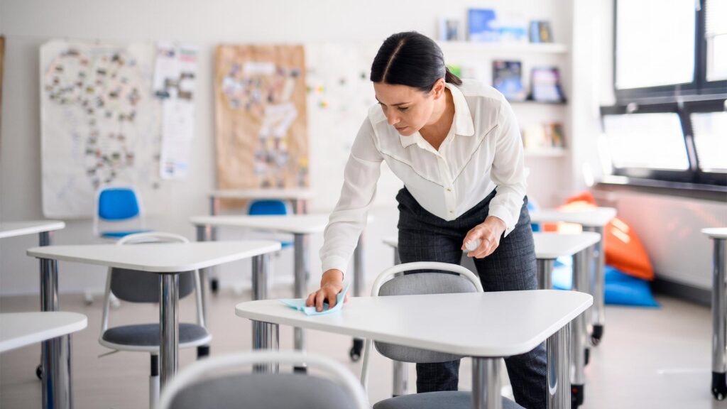 Hygienic school desk cleaning by Xpect Group cleaners